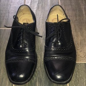 Black Stacey Adams dress shoes.